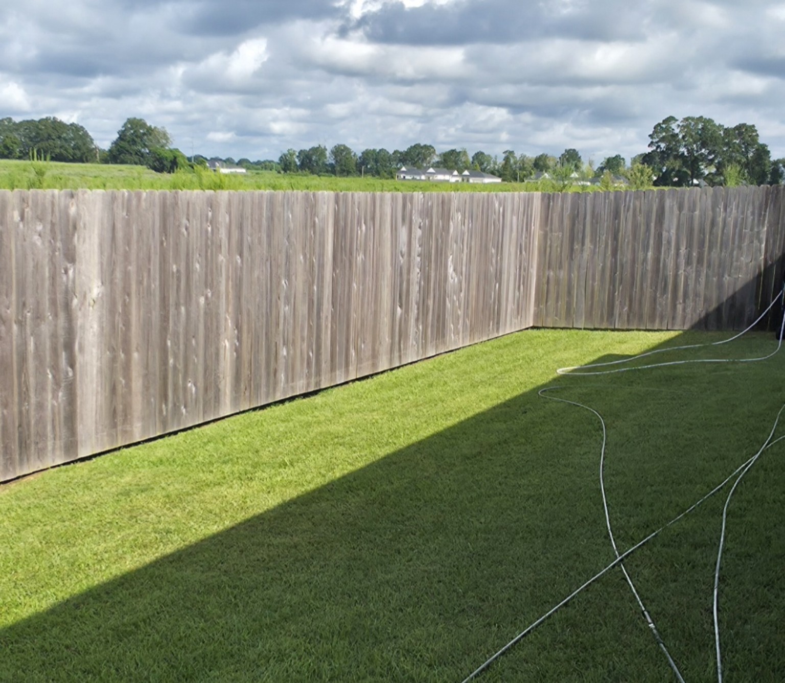 Wood fence cleaning: before cleaning