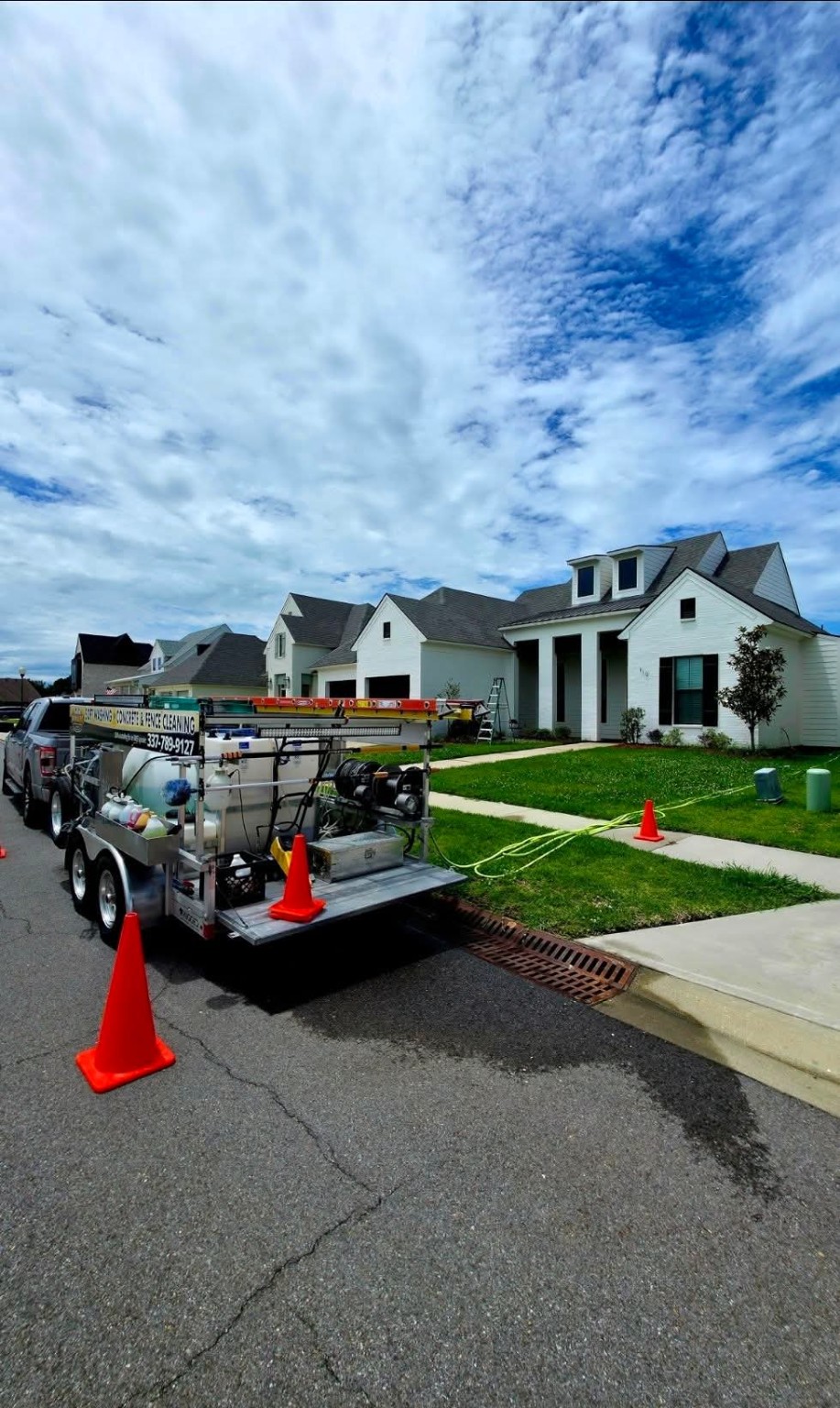 Quality Exterior Cleaning washing rig set up outside a white house